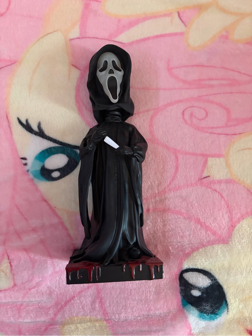 Glow in the dark ghostface bobble head